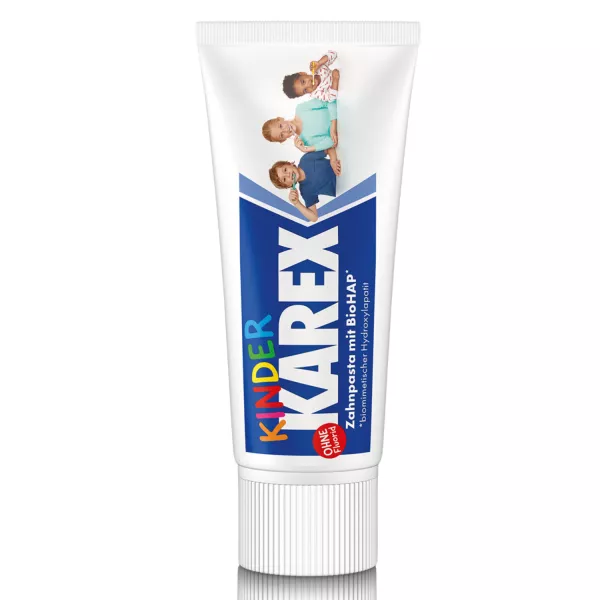 Karex Kinder toothpaste tube with images of smiling children, highlighting its fluoride-free formula for kids' oral care.