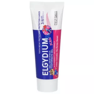 Elgydium Kids Toothpaste-Gel for 3-6 years, in a vibrant tube with red berries illustration and cartoon characters, promoting fun dental care.