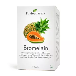 Phytopharma Bromelain Nahrungsergänzungsmittel-Box mit Ananas und Papaya. Weiße Verpackung mit grünem Blattlogo. Produkt betont Verdauungsenzyme, Vitamine C, E, D3 und Mineralstoffe auf Deutsch. 45 vegane Kapseln für die Verdauungsgesundheit.